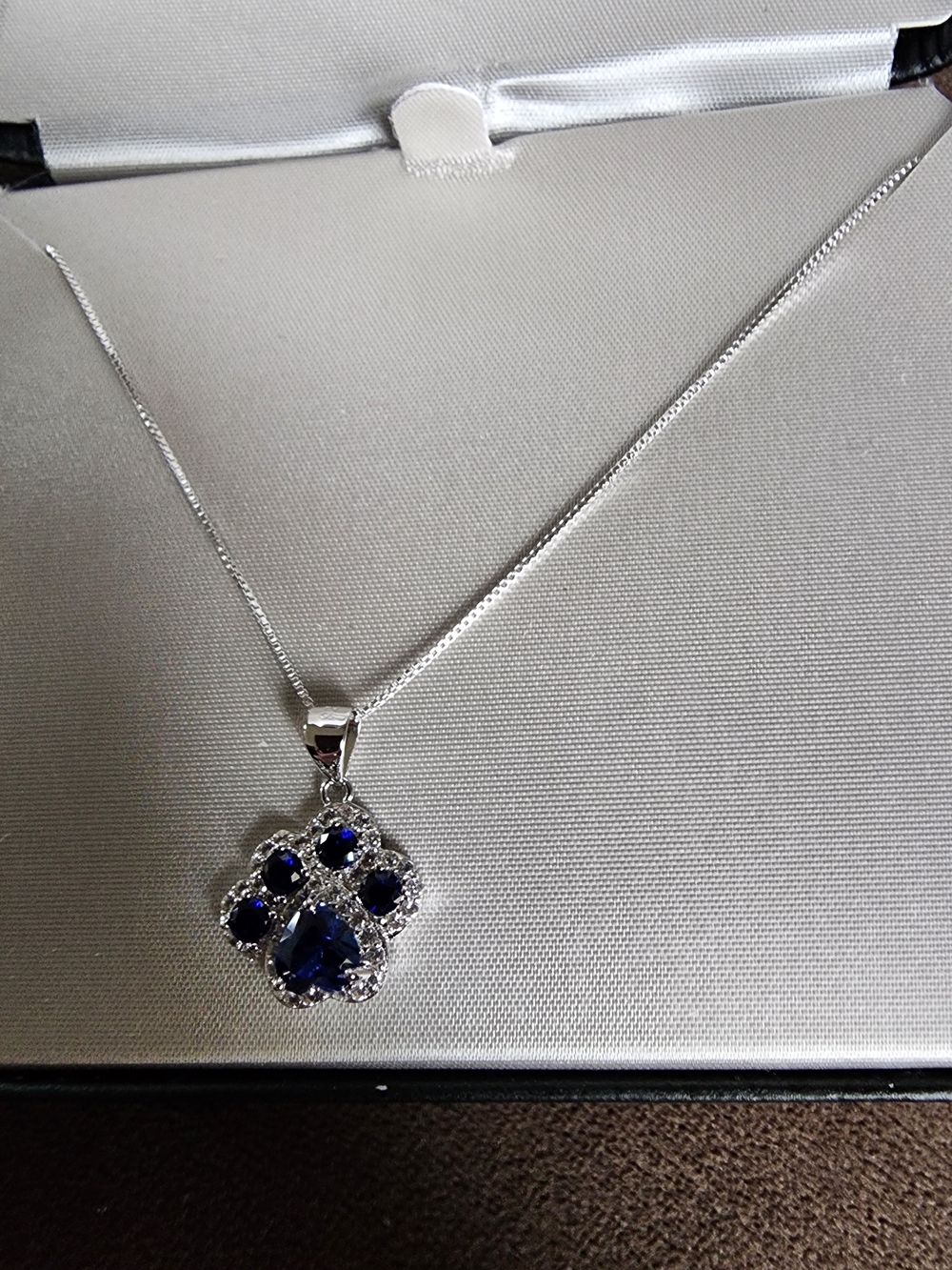 Elegant Silver Necklace with Blue Gemstone Pendant